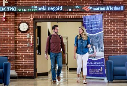 Students walking to class in Morgan Hall 